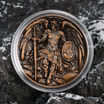 Leabet spiritual keepsake coin displayed on a flat surface highlighting weathered metal artwork