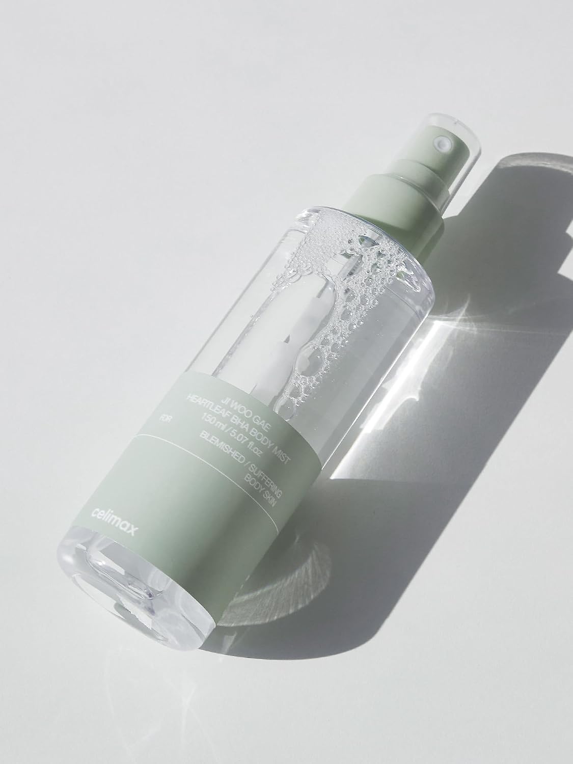 Celimax exfoliating body spray for back acne clearing showing the 360 degree pump nozzle