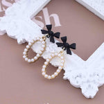 Zeshimb gold rhinestone snowflake drop earrings side angle