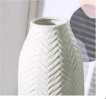 Hjn flower vase holding fresh eucalyptus and green stems