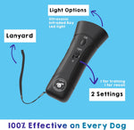 Owner using Bark Begone behavior corrector device during outdoor walk