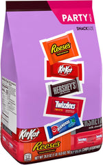 Individually wrapped Reese's, Kit Kat, and Hershey's snack size pieces displayed outside the party pack packaging