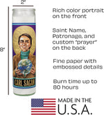 Unscented Carl Sagan glass candle lit in a dark room