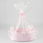 APOMOONS empty baby gift basket front view showing the pink woven cotton rope texture and handles.