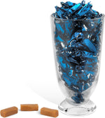 Dual wrapped individual milk caramel pieces spread out