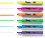 Sharpie highlighters writing sample on paper surface