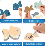 Classroom bulletin board decorated with vibrant boho fish paper cutouts