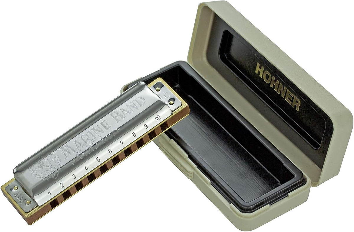 Close up of the Hohner Marine Band diatonic harmonica wooden comb and brass reeds.