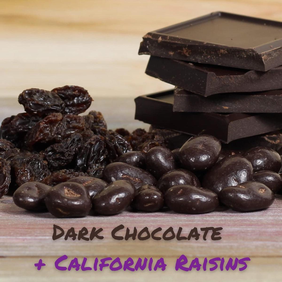 Dark chocolate raisins falling from a bag