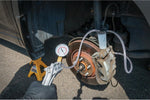 Performance Tool hand vacuum pump gauge close up view