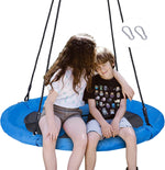 SUPER DEAL blue saucer tree swing front view in a spacious backyard