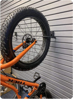 Close up of protective soft touch rubberized bike hook coating