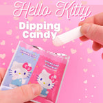 Individual Hello Kitty strawberry candy packets flat lay
