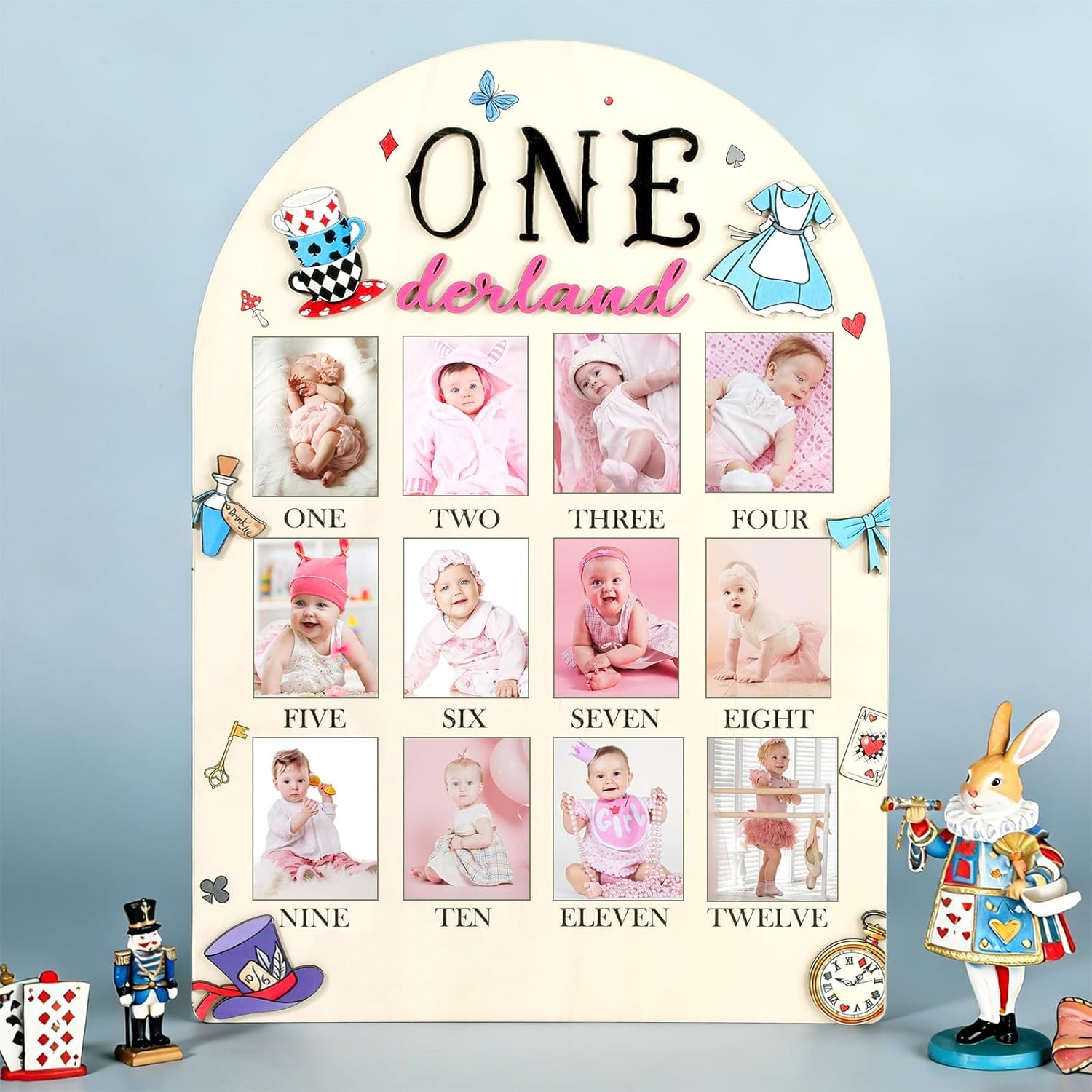HarpandTimbrel Wonderland My First Year Photo Board front view featuring twelve months milestone slots for baby birthday decorations.