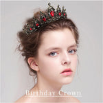 SuPoo sparkly rhinestone tiara highlighting red teardrop crystals