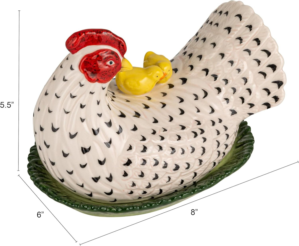Hand-painted multicolor hen and chicks lid resting on a green nest base.