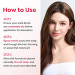 Hair mist being applied to model hair for frizz control