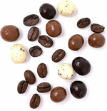 Close up of milk dark and white chocolate covered espresso beans