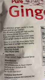 Close up view of the individually wrapped authentic ginger hard candies spread out on a clean surface.