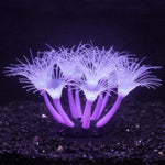 Bluecoco silicone sunflower coral aquarium decoration front view showing purple glowing petals under blue light.
