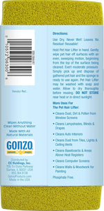 Gonzo pet hair sponge removing white cat fur from a dark fabric sofa