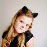 Merroyal glitter cat ears headband on model