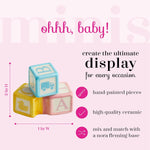 Nf Nora Fleming ohhh baby mini displayed on serving base