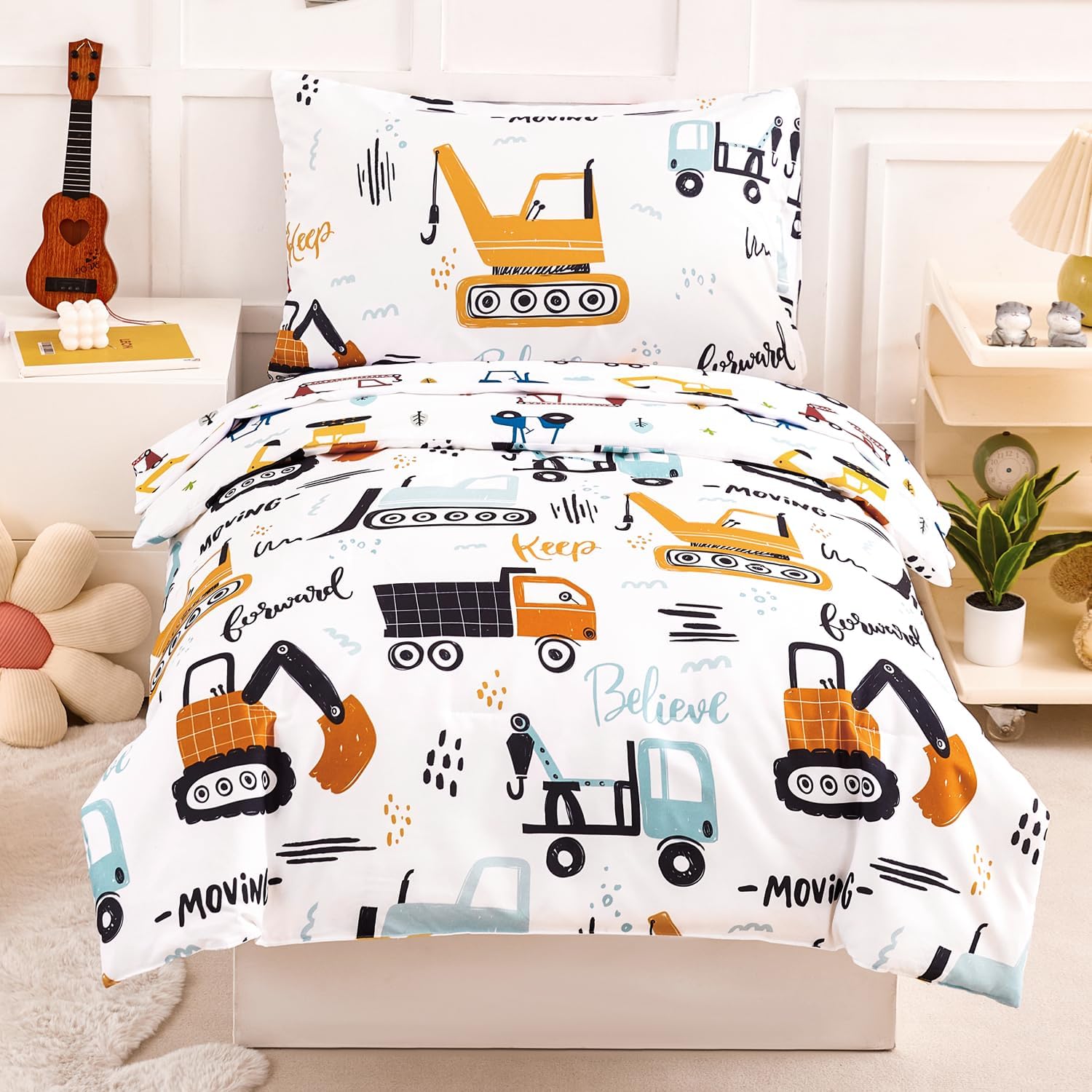 PERFEMET 4 piece toddler bedding set showing the front view of the car printed white comforter