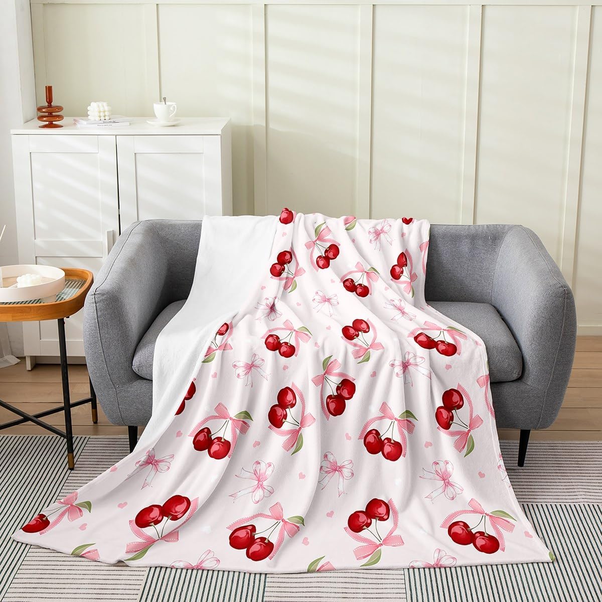 Feelyou Bowknot Cherry Fleece Throw Blanket front view featuring pink bows and red cherries