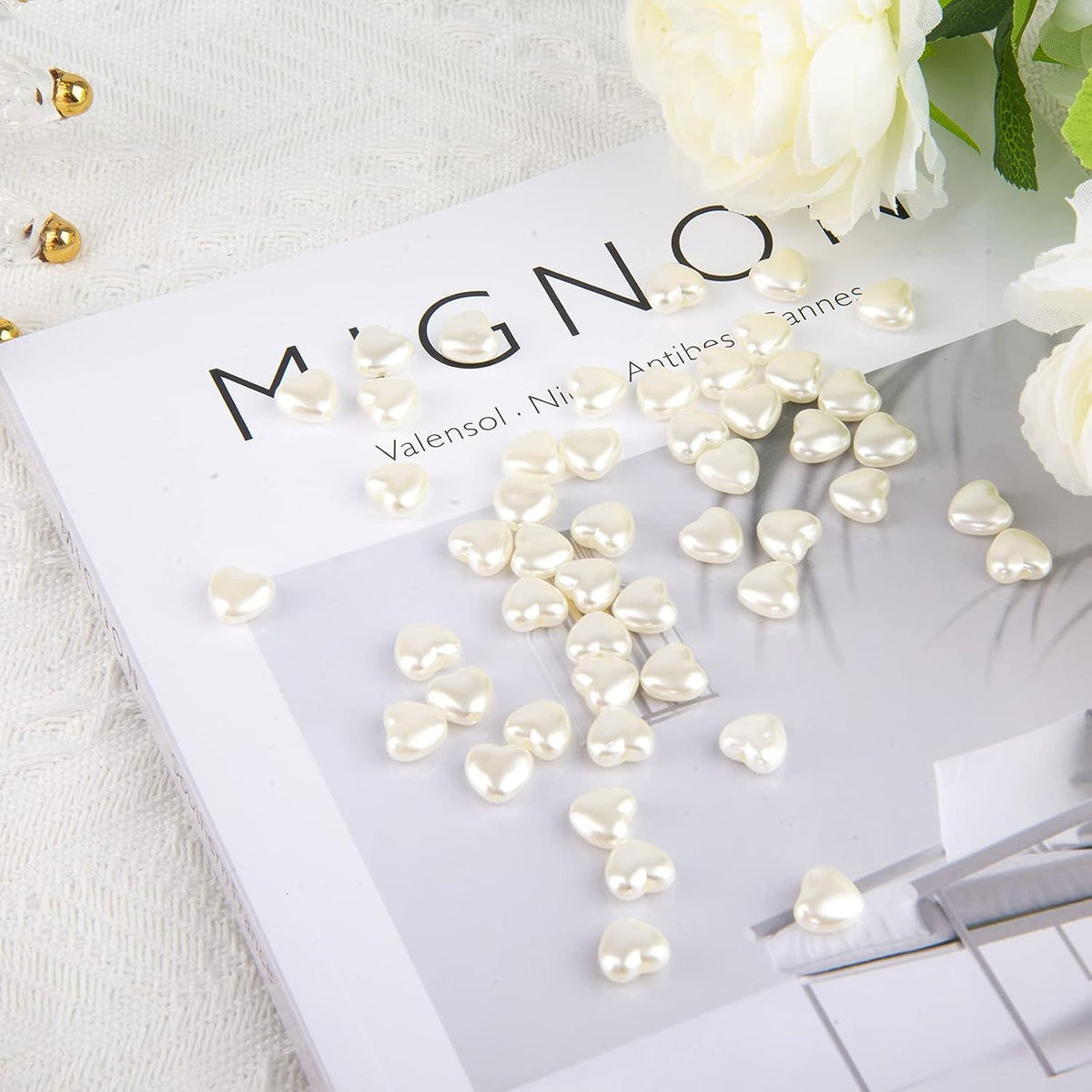 Gadjica heart and bowknot shape white pearl charms close up crafting supply