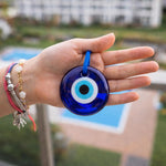Erbulus Turkish Blue Evil Eye Wall Hanging displayed on home door entrance