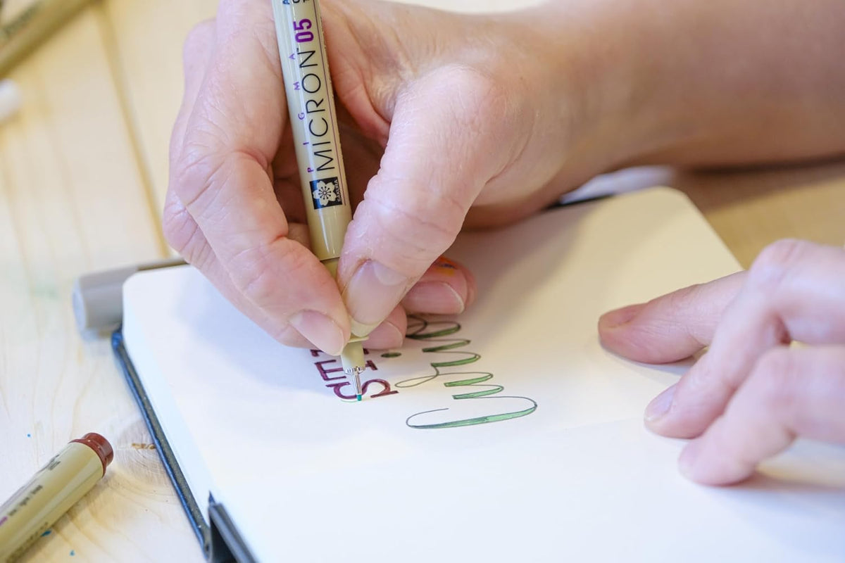 Close-up of Sakura Pigma Micron fine nib tips and colors