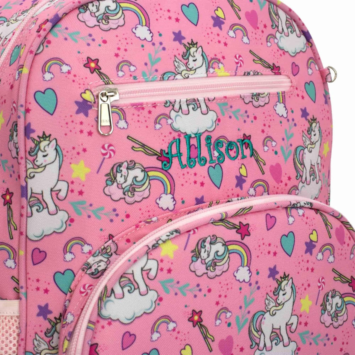 Dibsies unicorn school backpack showing custom embroidery name detail