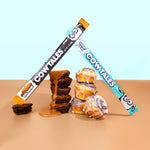 Close-up of a cut caramel stick highlighting the rich cream center filling.