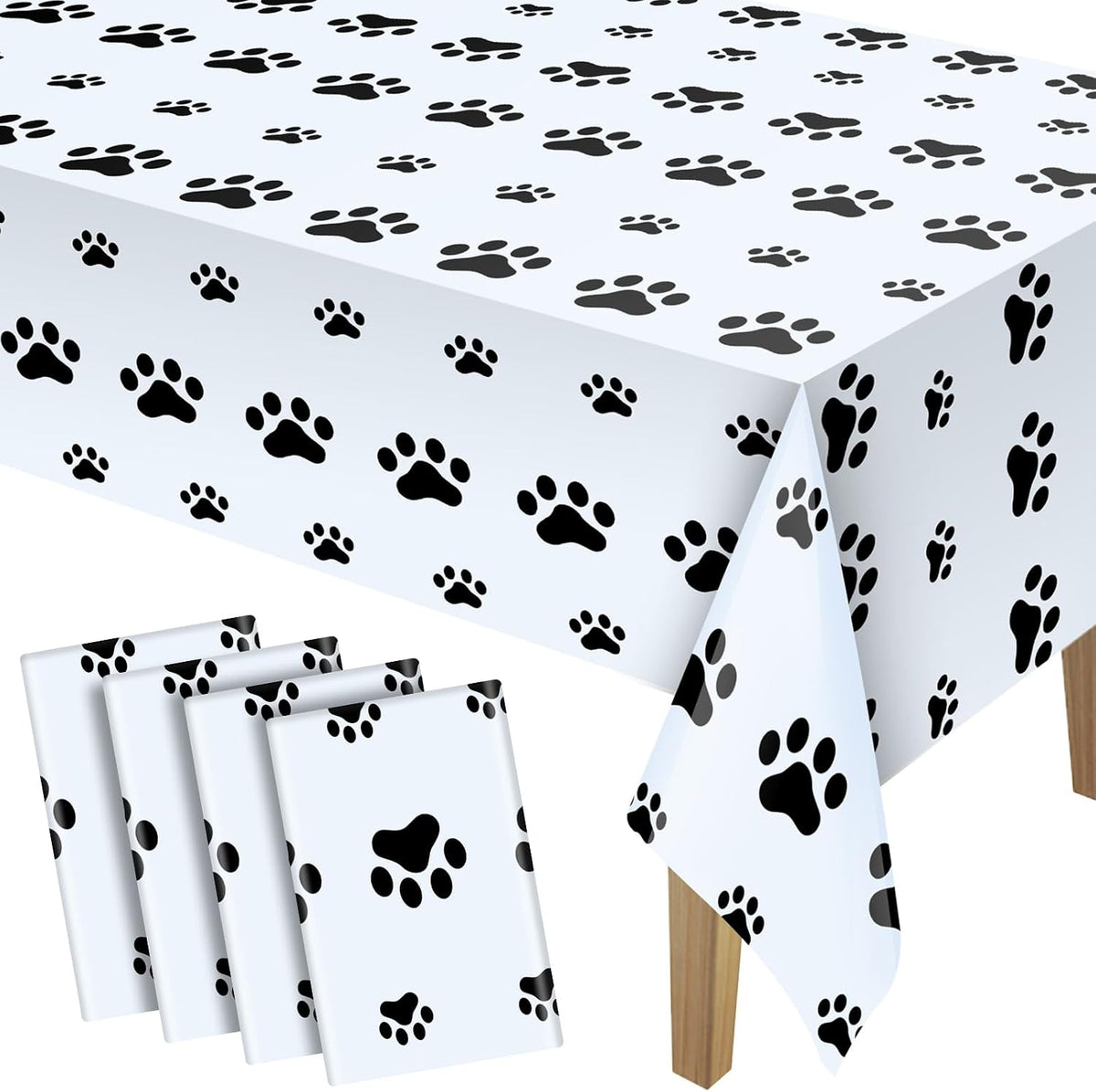 Two pieces of pink paw print tablecloths stacked together