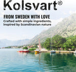A selection of colorful Kolsvart vegan and gluten-free Swedish gummy fish scattered on a clean surface.