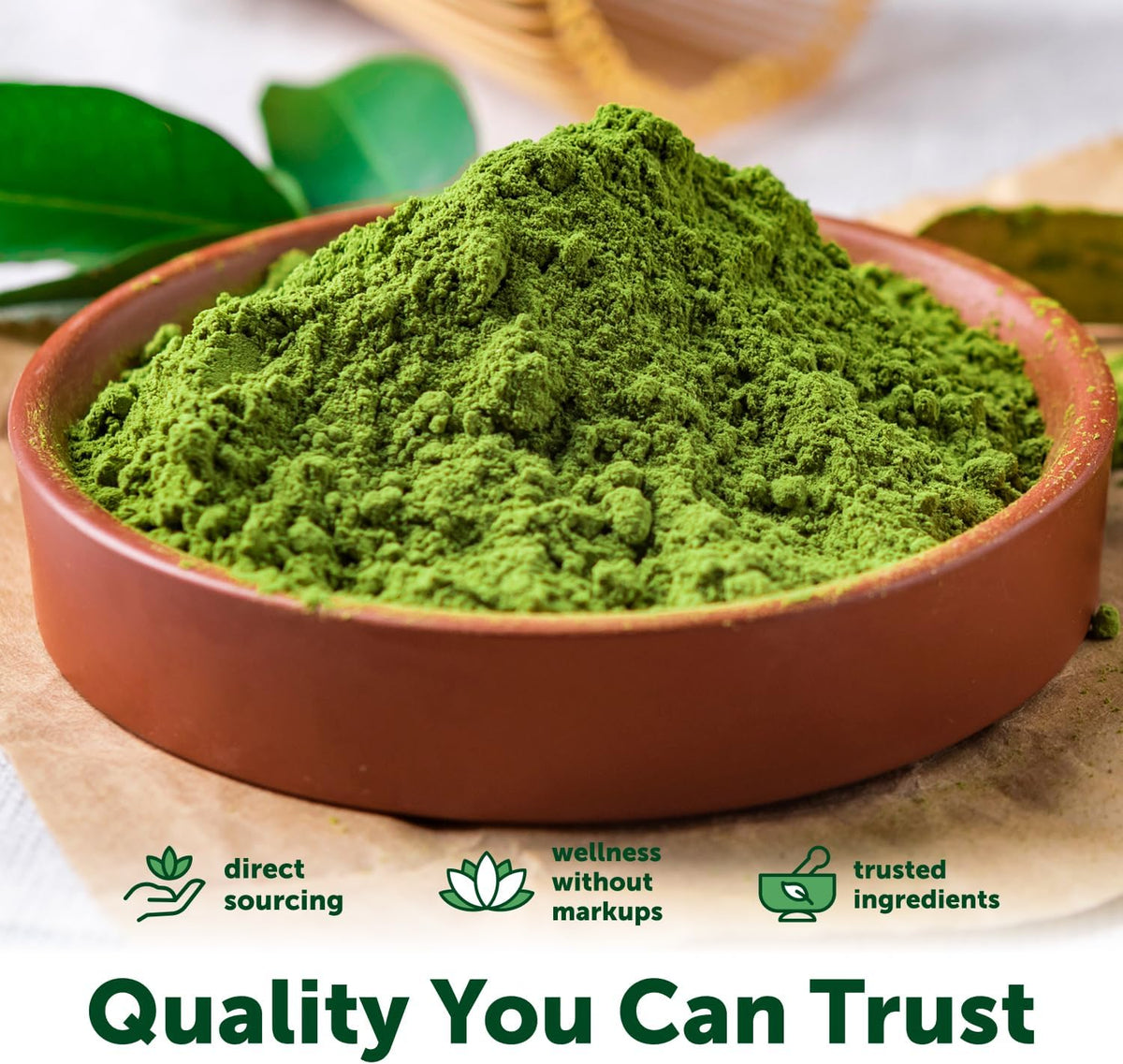 Healthy fruit and vegetable smoothie blended with green matcha powder
