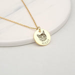 Person wearing Anavia engraved pet portrait disc necklace