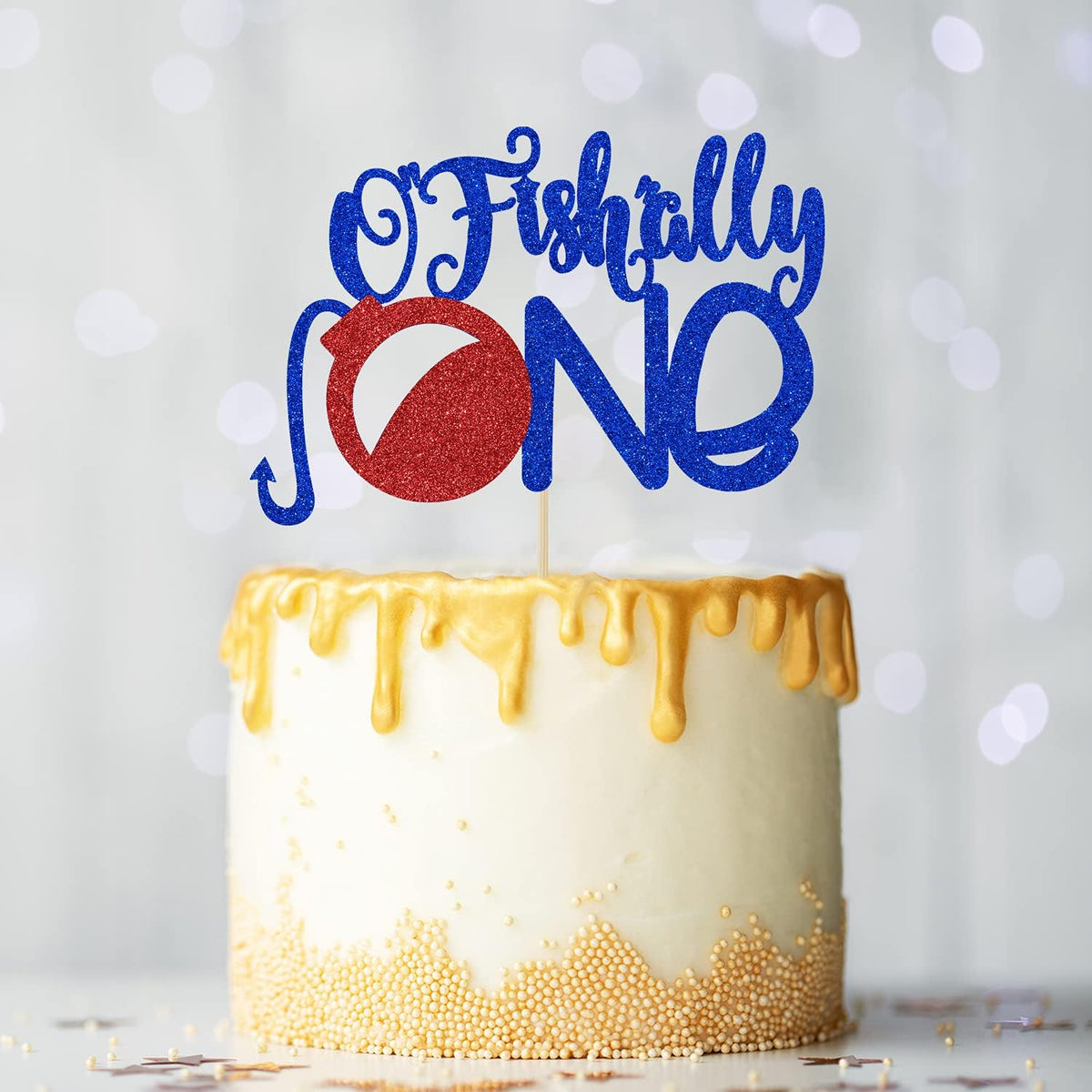 Hotmoon Ofishally One Cake Topper displayed on a decorated birthday cake.