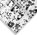 Various sizes of watch crown O-rings laid out