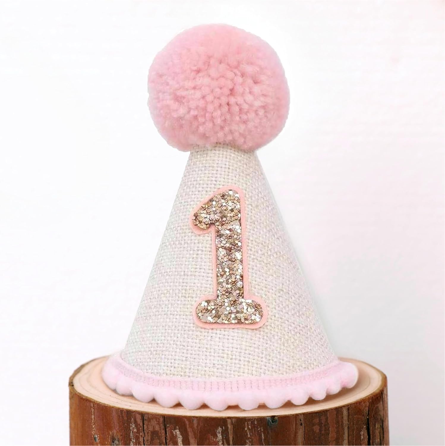 Ereniko boho first birthday hat front view featuring glitter number one and pink pom pom topper