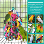 Natural palm and corn husk grass elements on conure toy.