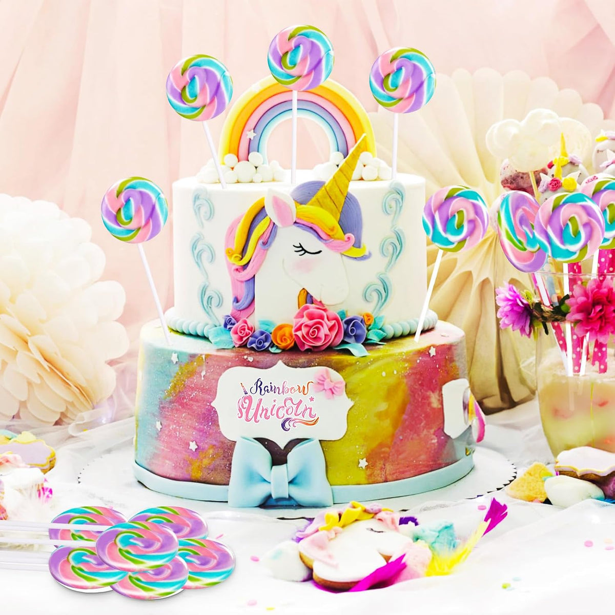 Unwrapped blueberry flavored Eora mermaid swirl lollipop showing pastel blue and pink details.
