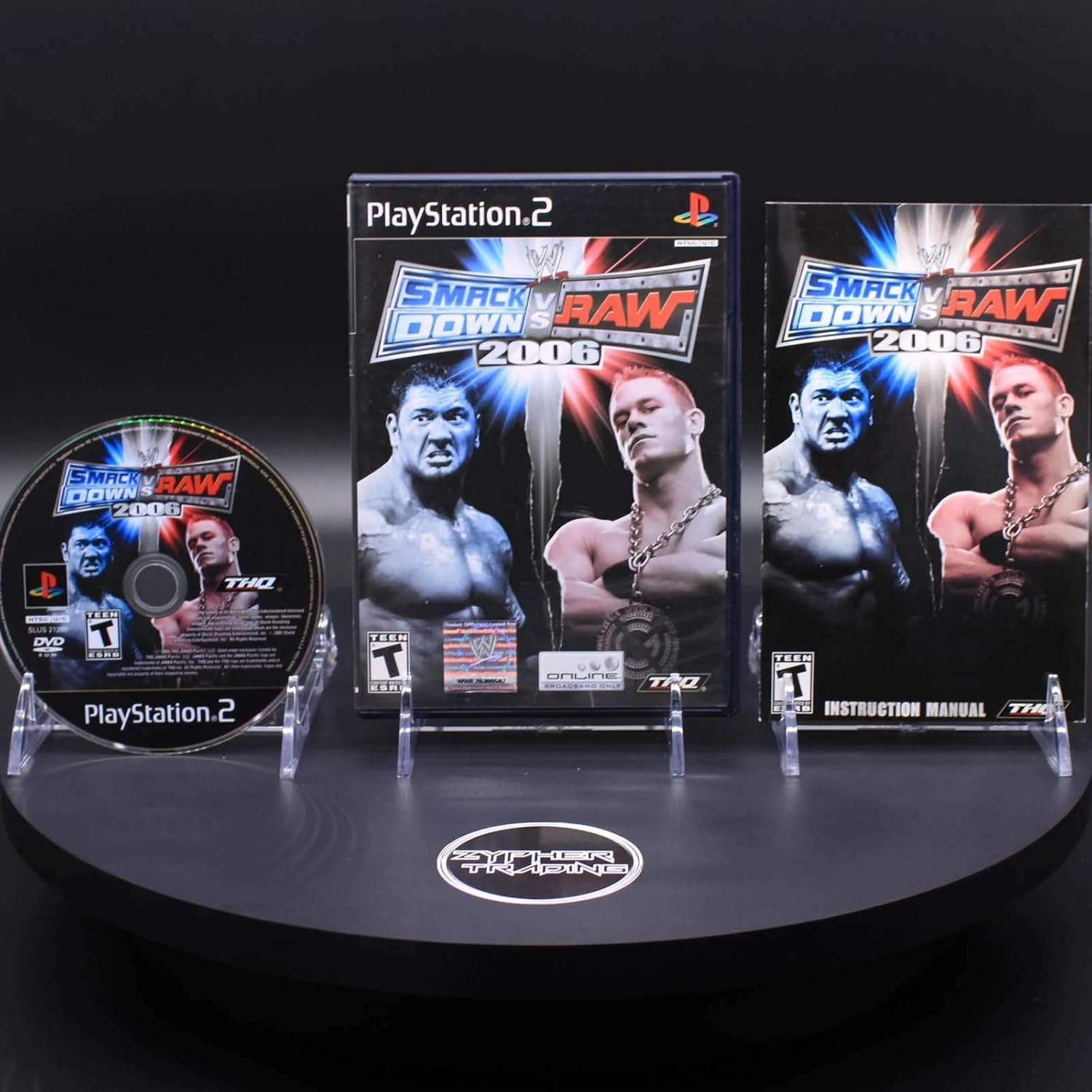 THQ WWE Smackdown vs Raw 2006 PlayStation 2 front view retail cover art featuring John Cena and Batista.