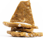 Close up of all natural Hawaiian macadamia nut candy pieces showcasing crunchy texture