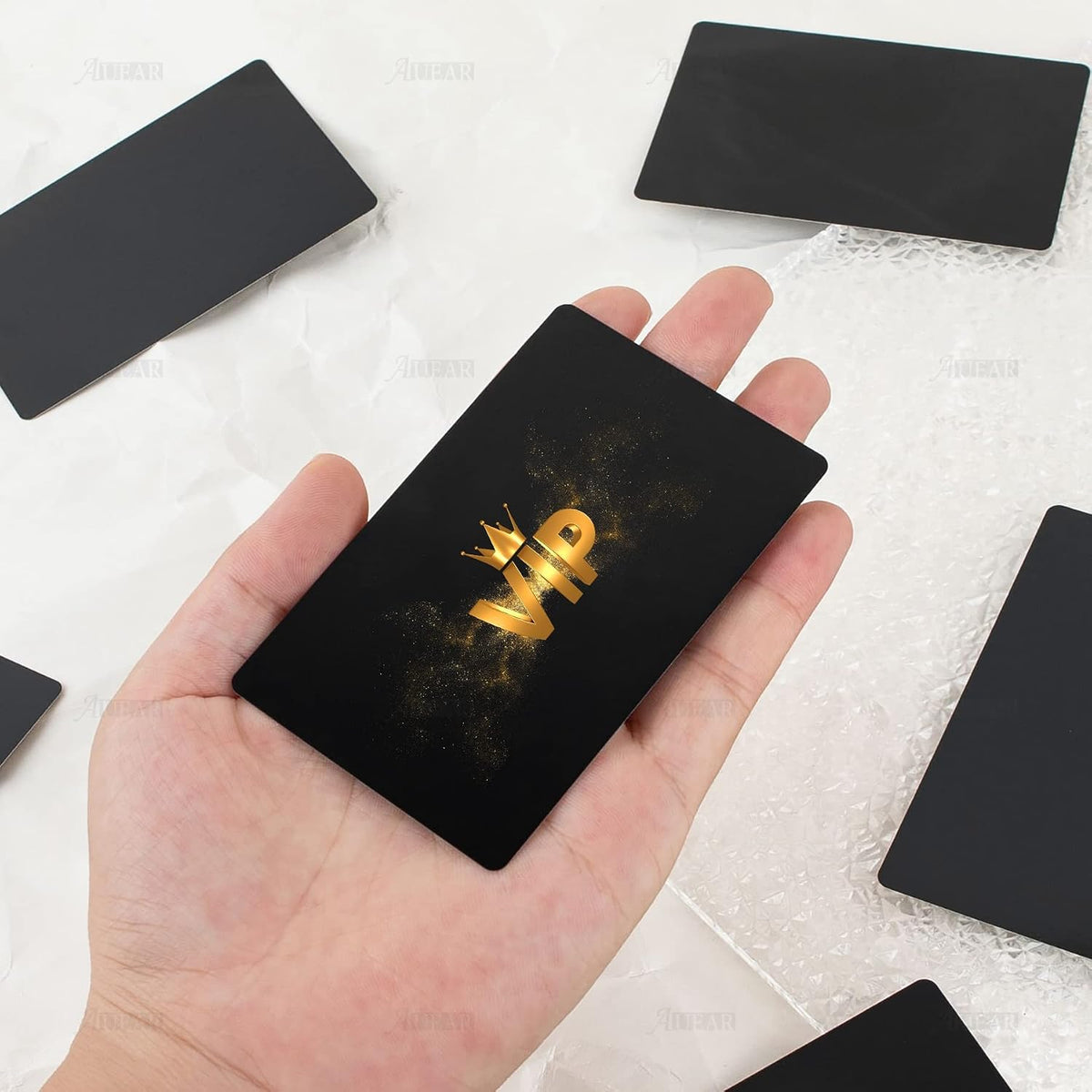AUEAR custom engraved metal card lifestyle shot