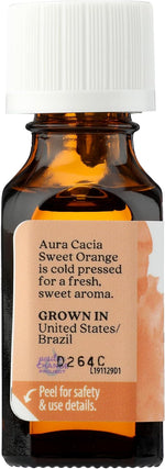 Aura Cacia sweet orange extract bottle showing size perspective