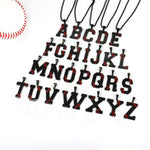LYNNON initial pendant with red stitching texture