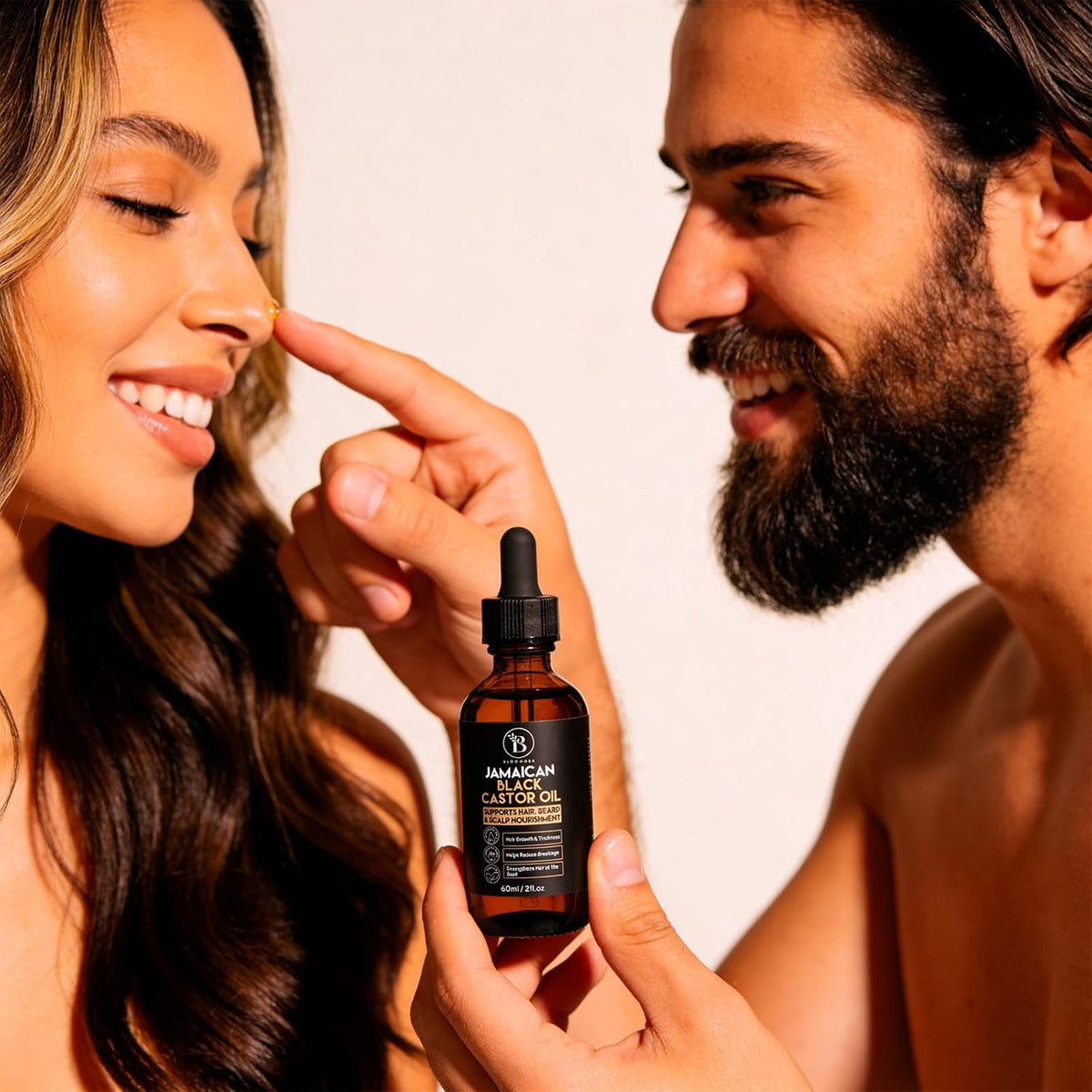Bloomora Jamaican black castor oil texture and viscosity display