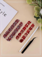 Various decorative shapes including hearts and drops from the EBANKU nail crystal set.
